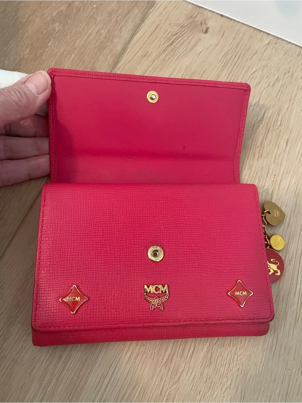MCM Pink Leather Continental Wallet with Charm Accents & Gold Hardware”